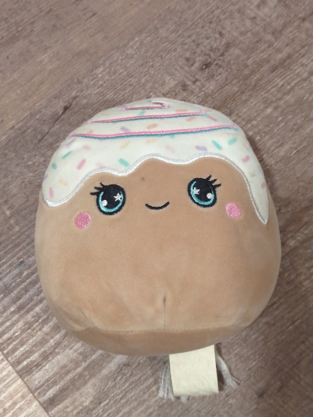 Squishmallows Cinnamon Roll Brown Plush with White Frosting and Pastel Sprinkles